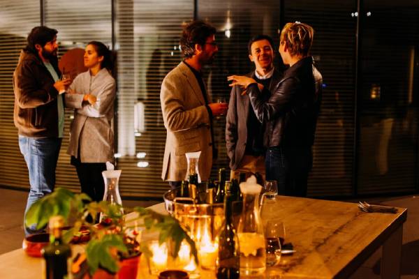 group of people talking at a party